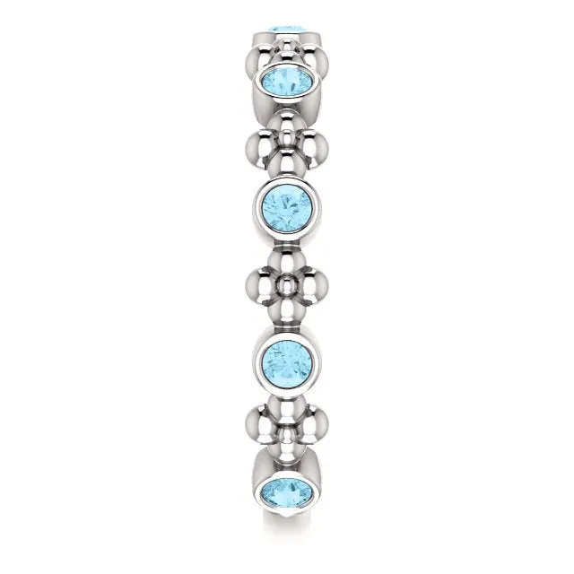 14KT GOLD 0.36 CTW ROUND AQUAMARINE BEZEL-SET BEADED FLORAL RING