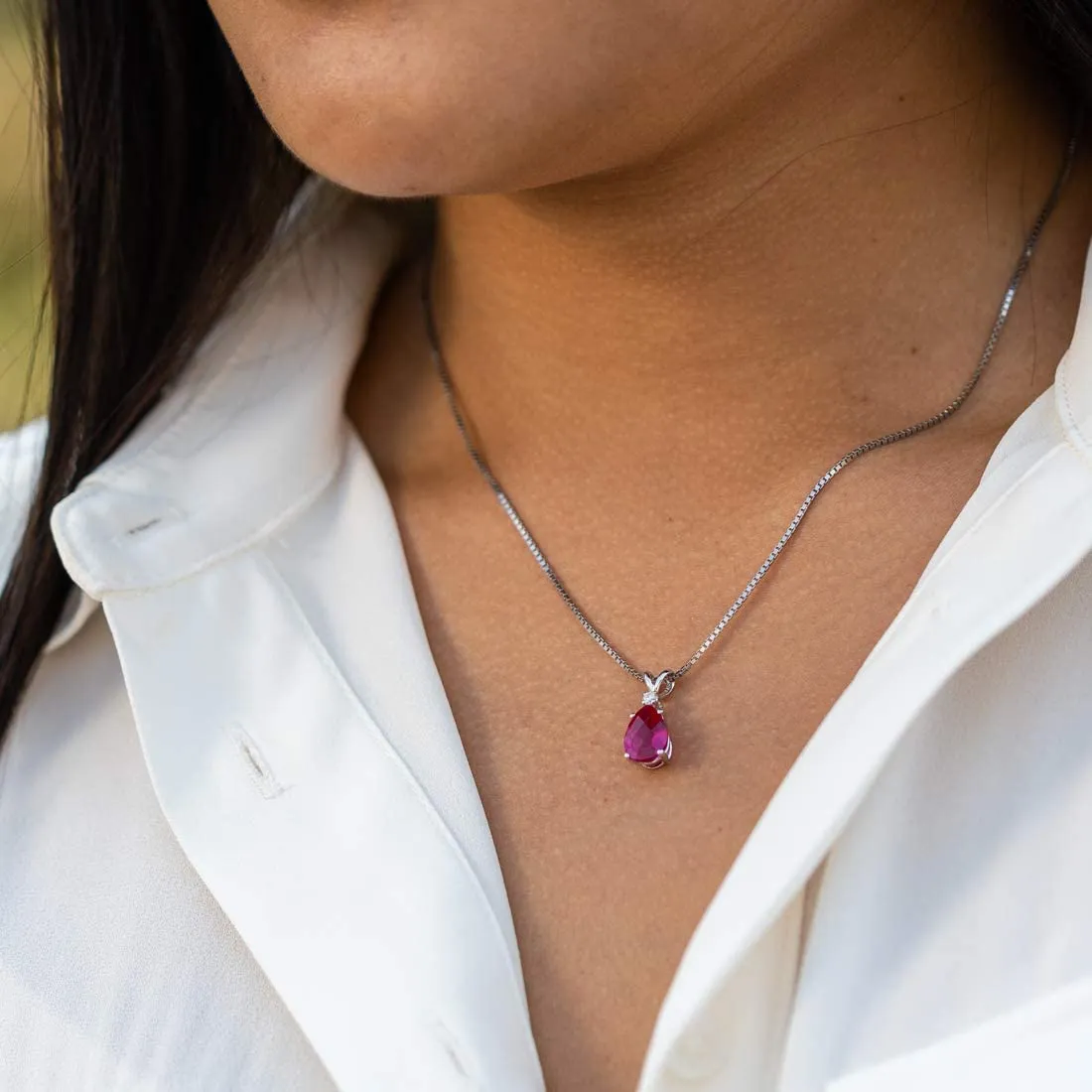 Diamond & Created Ruby Teardrop Pear Shape Solitaire Pendant in 14K Gold Plate Setting