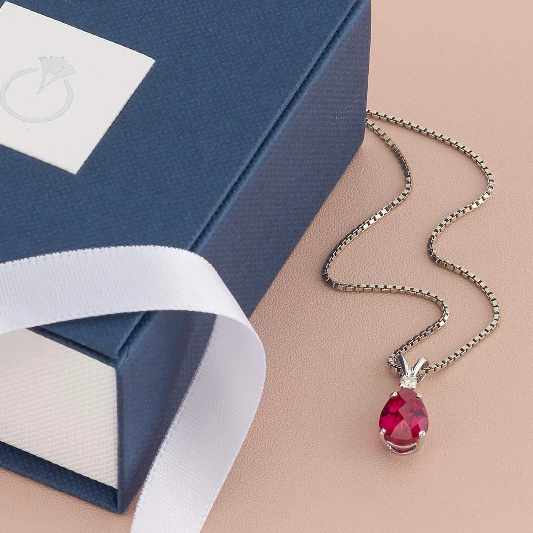 Diamond & Created Ruby Teardrop Pear Shape Solitaire Pendant in 14K Gold Plate Setting