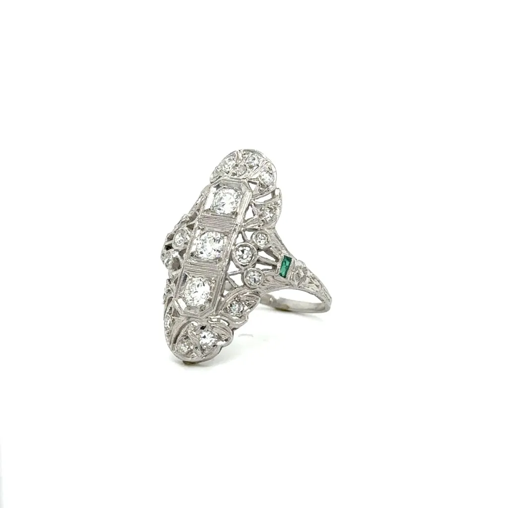 Platinum Art Deco Diamond Emerald Navette Filigree Ring at Regard Jewelry in Austin, Texas