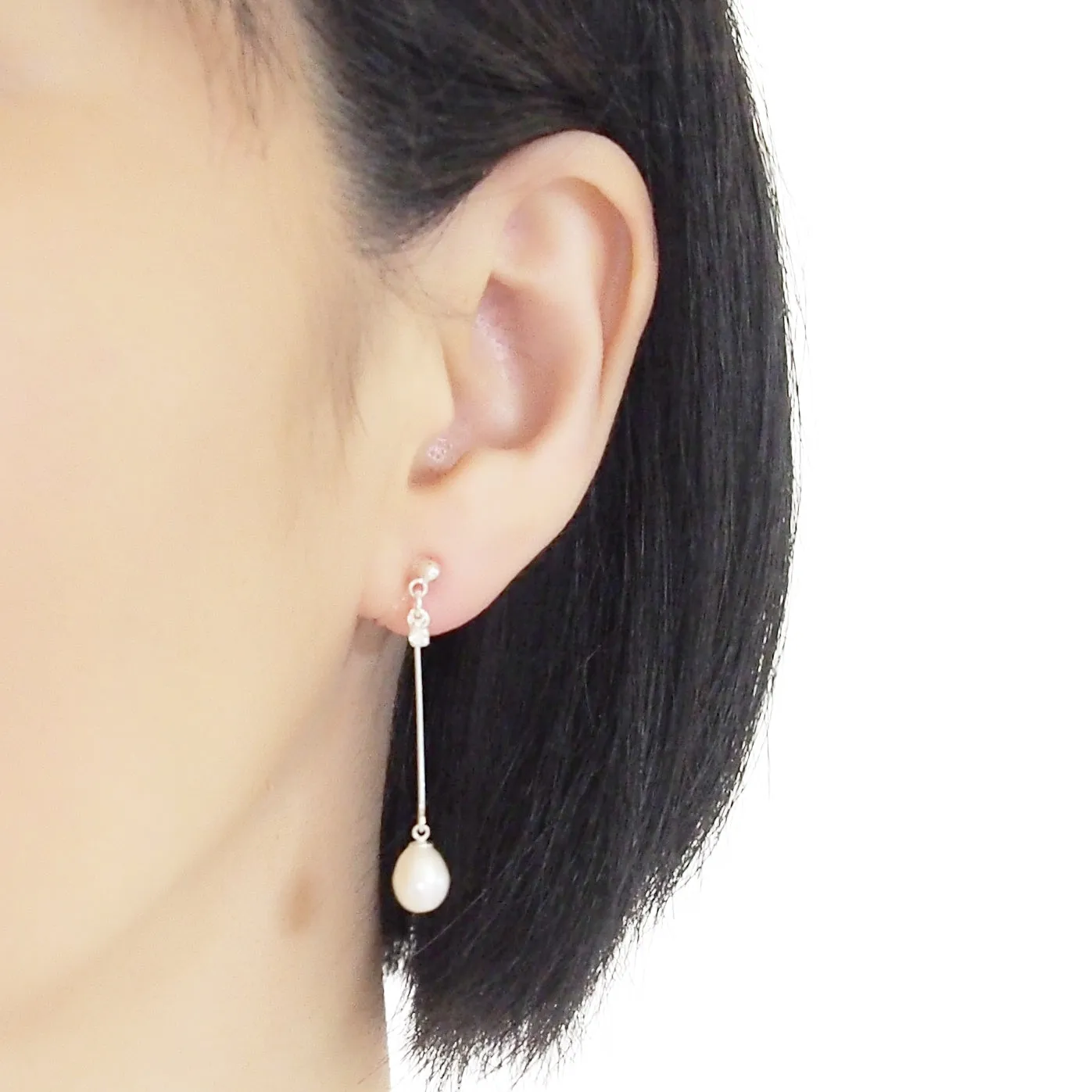 White Teardrop Freshwater Pearl Invisible Clip On Earrings (Silver tone)